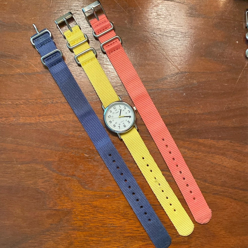 Timex Weekender 31 mm, yellow second hand, comes with 3 straps. Needs battery.